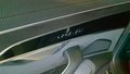 View of control buttons for electric rear seat adjustment