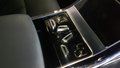 View of control buttons for electric rear seat adjustment