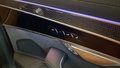 View of control buttons for electric rear seat adjustment