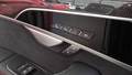View of control buttons for electric rear seat adjustment