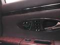 View of control buttons for electric rear seat adjustment