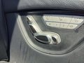 View of control buttons for electric rear seat adjustment