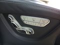 View of control buttons for electric rear seat adjustment