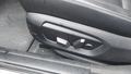View of control buttons for electric rear seat adjustment
