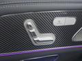 View of control buttons for electric rear seat adjustment
