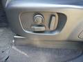 View of control buttons for electric seat adjustment