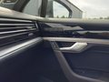 View of control buttons for electric rear seat adjustment