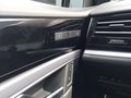 View of control buttons for electric rear seat adjustment