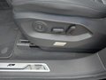 View of control buttons for electric rear seat adjustment