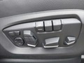 View of control buttons for electric seat adjustment