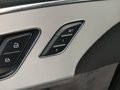View of control buttons for electric rear seat adjustment