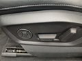 View of control buttons for electric rear seat adjustment