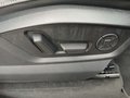 View of control buttons for electric rear seat adjustment