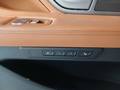 View of control buttons for electric rear seat adjustment