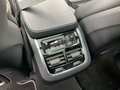 View of control buttons for electric rear seat adjustment