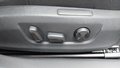 View of control buttons for electric seat adjustment