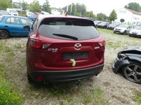 Skats no kreisās puses aizmugurē