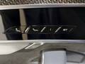View of control buttons for electric rear seat adjustment
