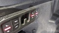 Vista de los botones de control del asiento trasero
