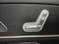 View of control buttons for electric rear seat adjustment