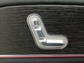 View of control buttons for electric rear seat adjustment