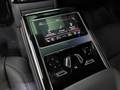 View of control buttons for electric rear seat adjustment