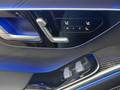 View of control buttons for electric rear seat adjustment
