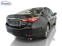 Skats no labās puses aizmugurē