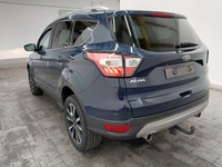 Skats no kreisās puses aizmugurē