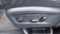 View of control buttons for electric rear seat adjustment