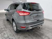 Skats no kreisās puses aizmugurē