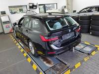 Vista traseira esquerda