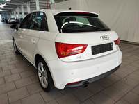 Вид сзади слева