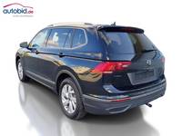 Vista traseira esquerda