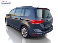 Vista traseira esquerda