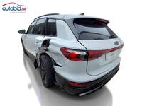 Skats no kreisās puses aizmugurē