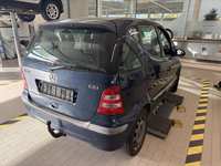 Skats no labās puses aizmugurē