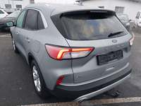 Вид сзади слева