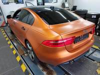 Skats no kreisās puses aizmugurē