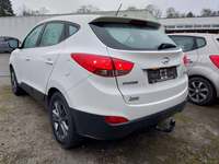 Вид сзади слева