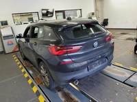 Vista traseira esquerda