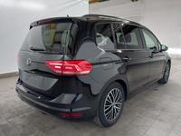 Skats no labās puses aizmugurē