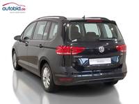 Вид сзади слева