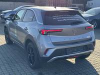 Вид сзади слева