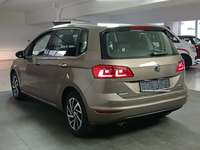 Вид сзади слева