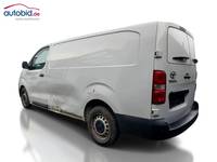 Вид сзади слева