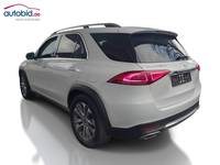 Вид сзади слева