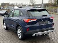 Вид сзади слева