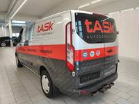 Вид сзади слева