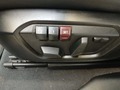 View of control buttons for electric seat adjustment